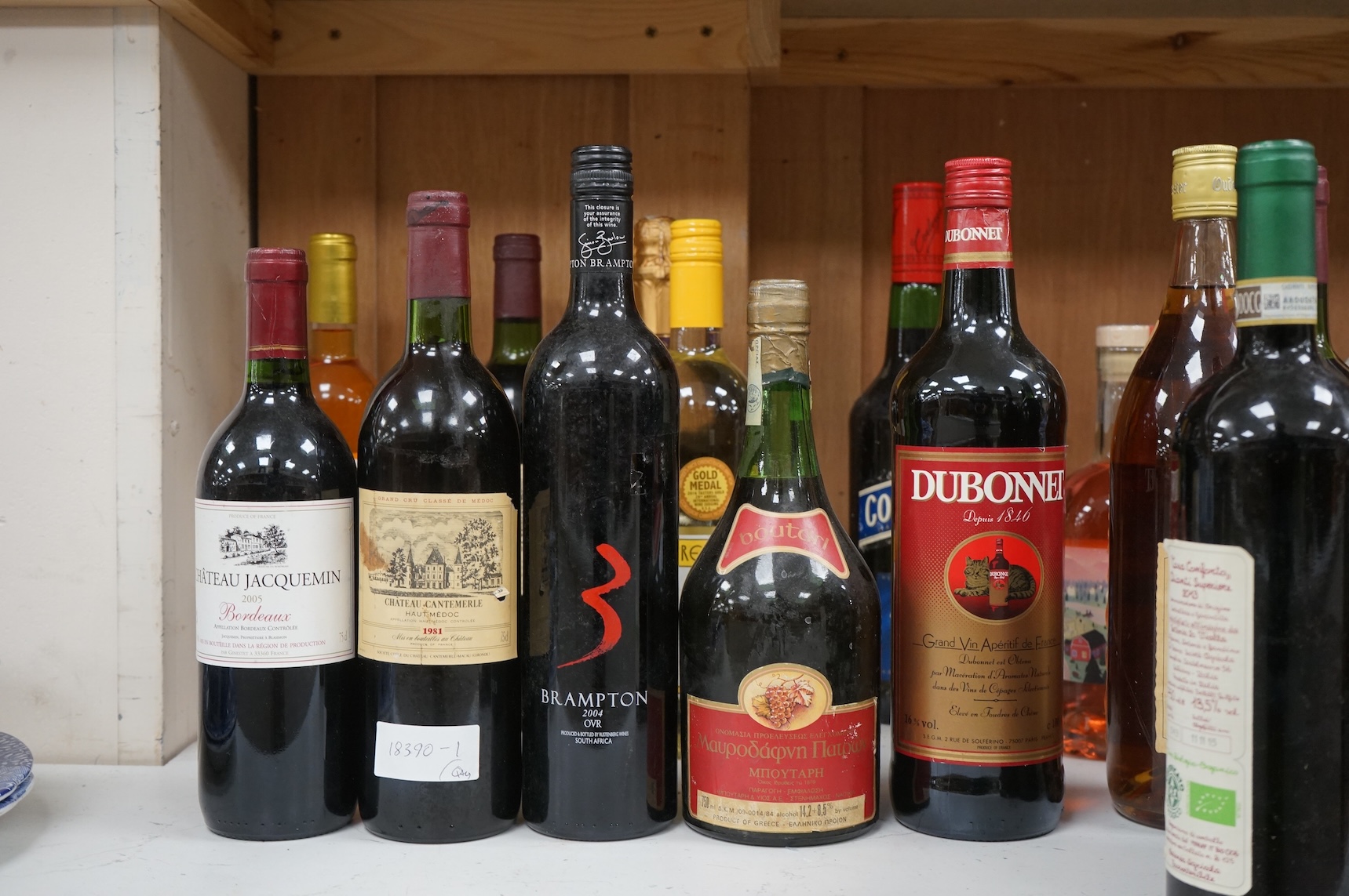 Four bottles Chateau Cauteuate, 1981 together with a group of assorted wines and spirits